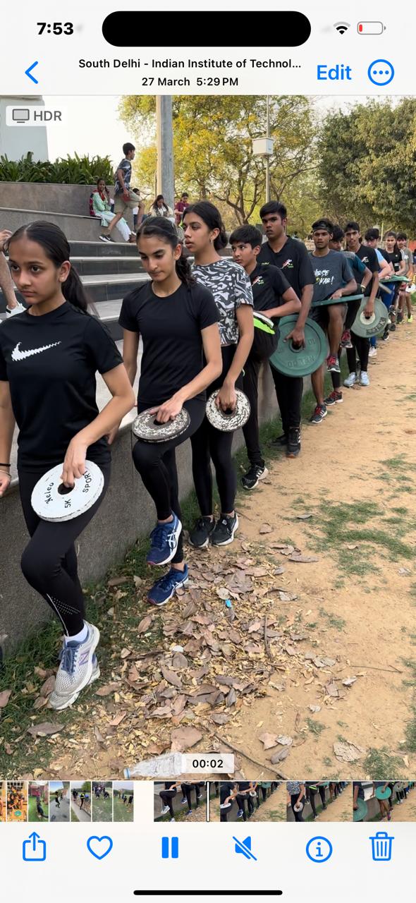 Young athletes celebrating achievement at academy